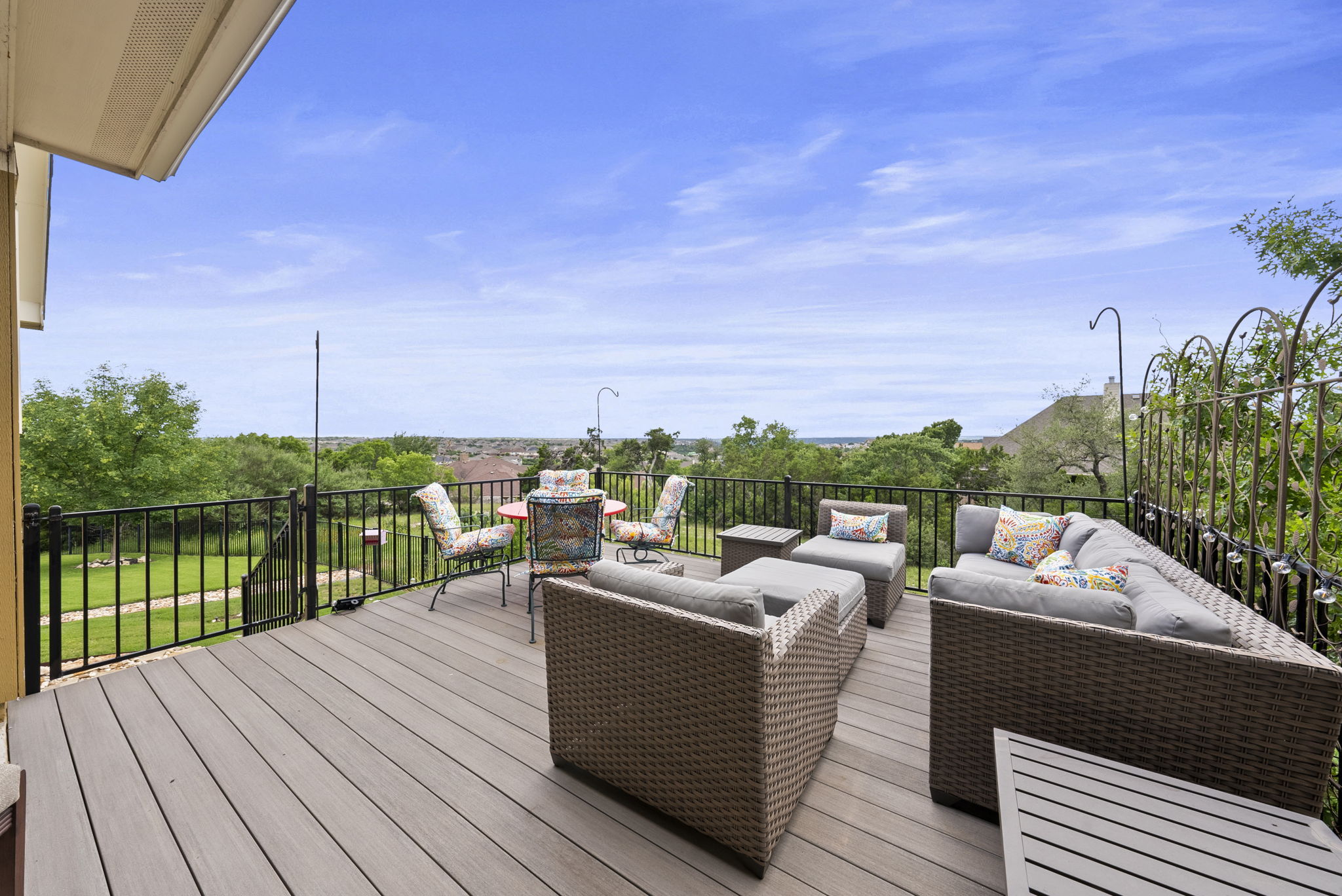 Large patio with dual steps with gates.