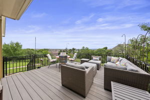 Large patio with dual steps with gates.