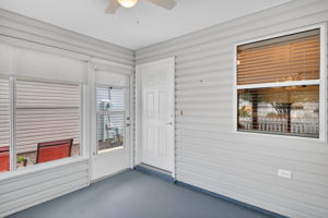 Glass-Enclosed Under Air Lanai with Front Entry