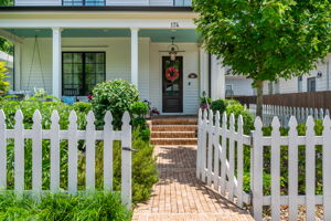 White Picket Fence Enclosing Front Yard
