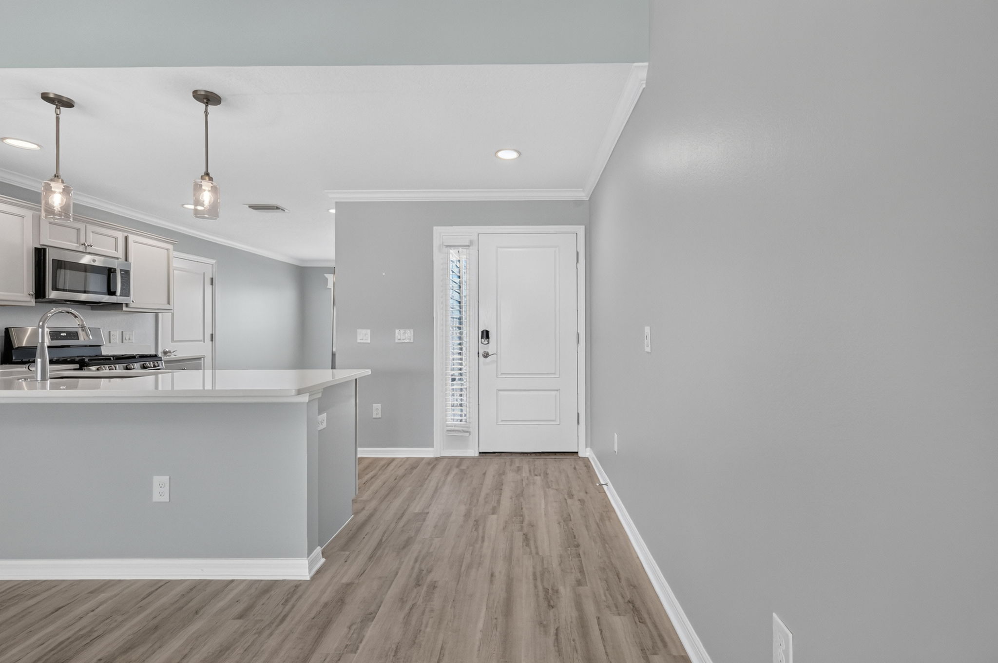 Foyer, Front Entry, and Kitchen