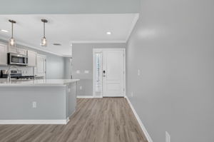 Foyer, Front Entry, and Kitchen