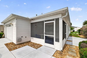 Front Elevation with Front and Side Patios and Lanai