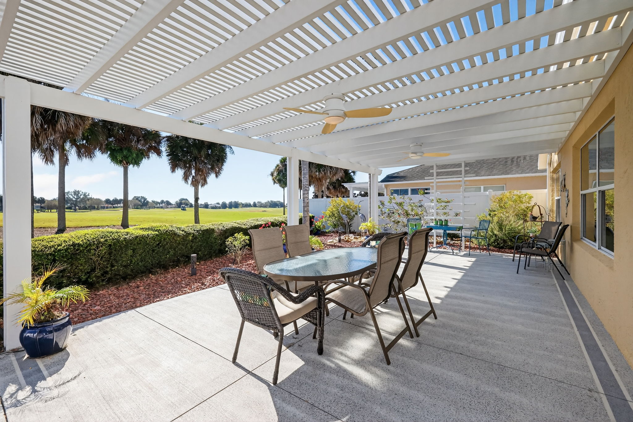 Rear Courtyard with Pergola and Golf Course Views