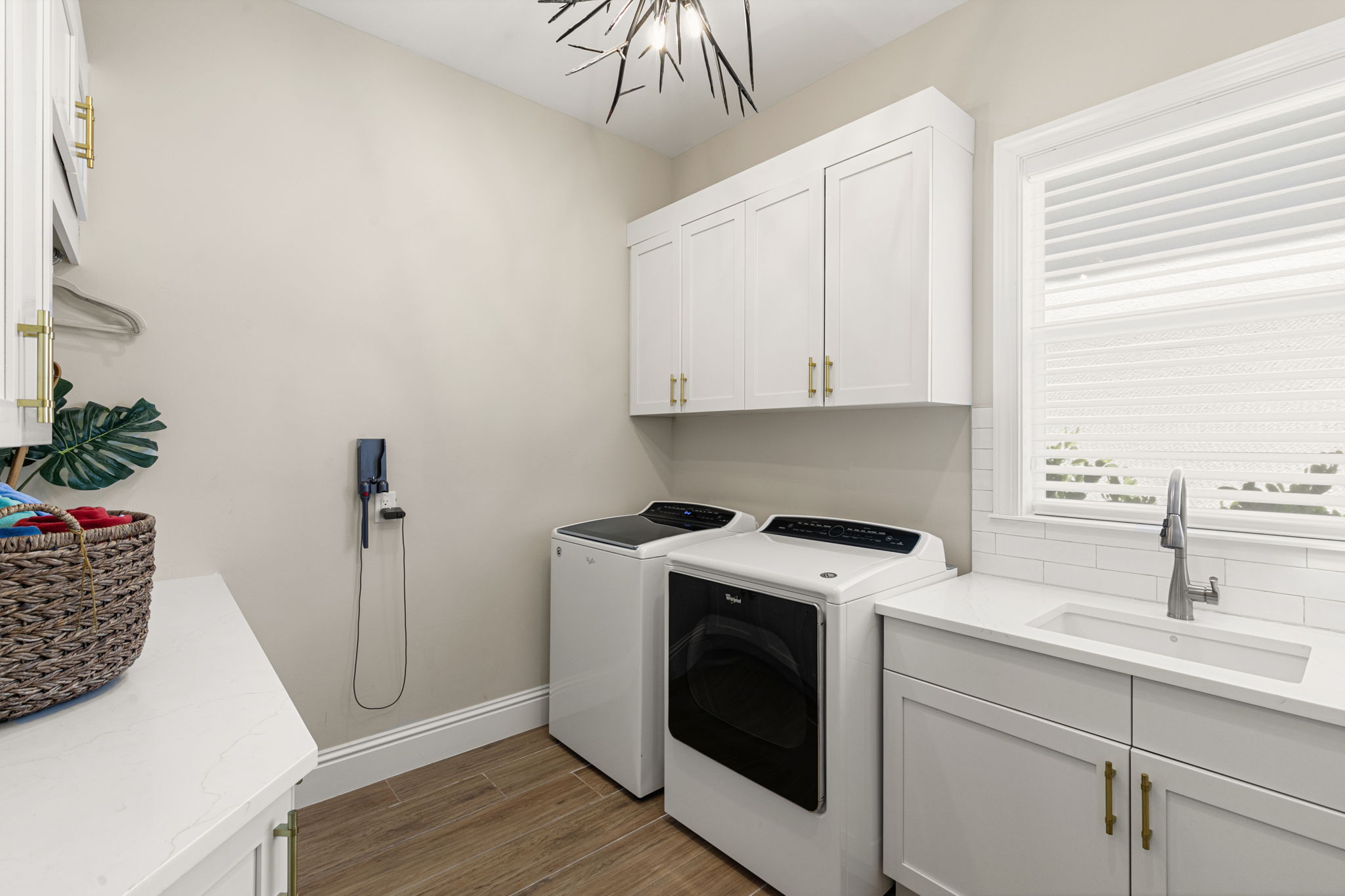 Laundry Room with sink and storage