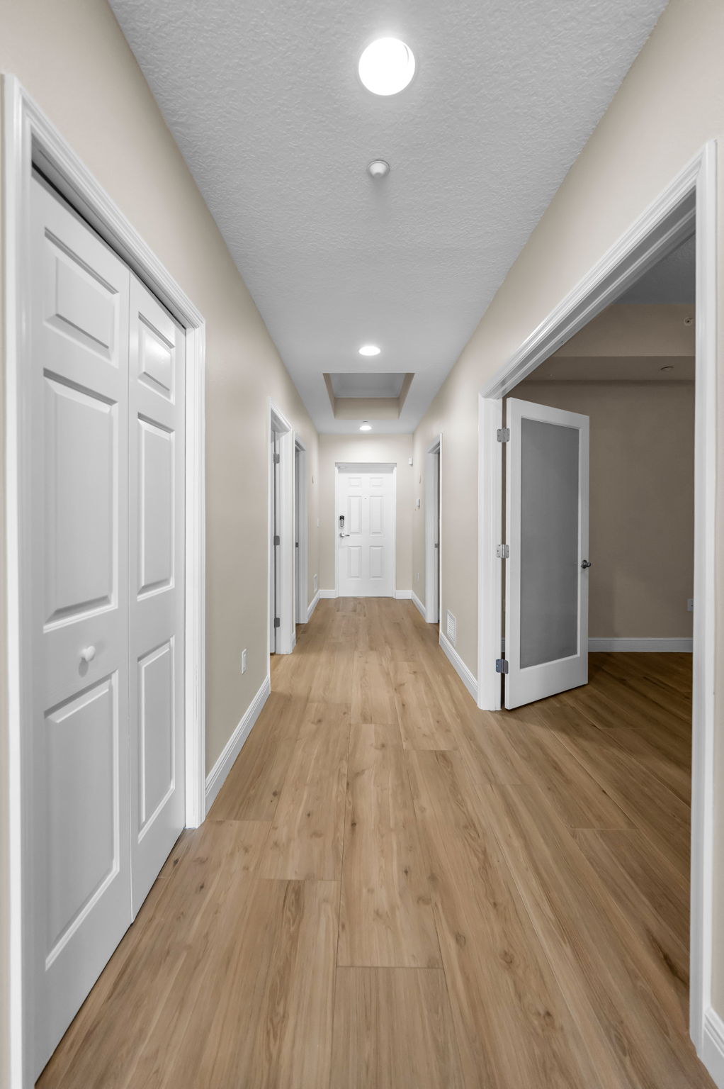 From Kit Area to Guest Quarters New Floors- New Wall Finish.