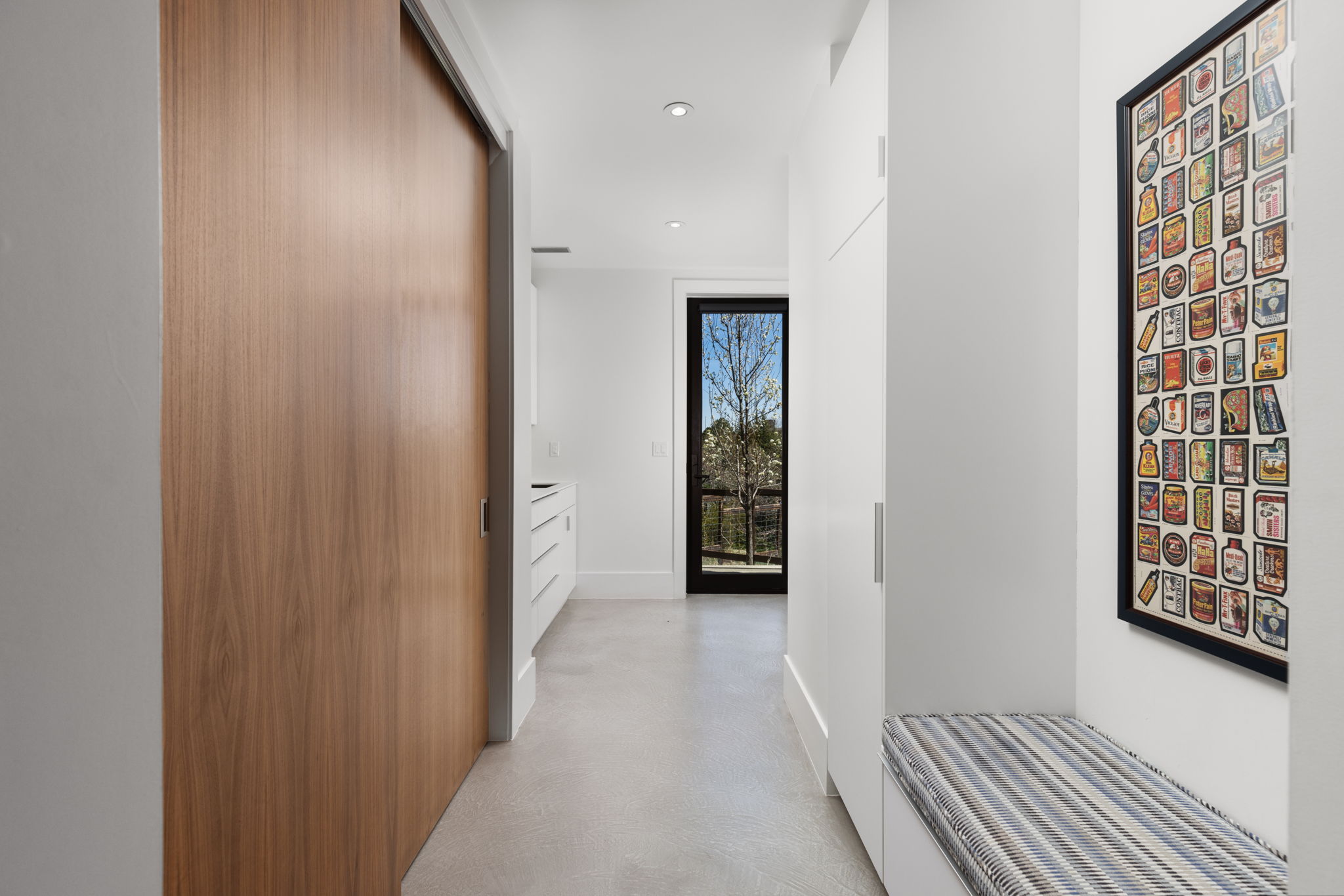 Lower level mudroom adjacent to garage entrance.