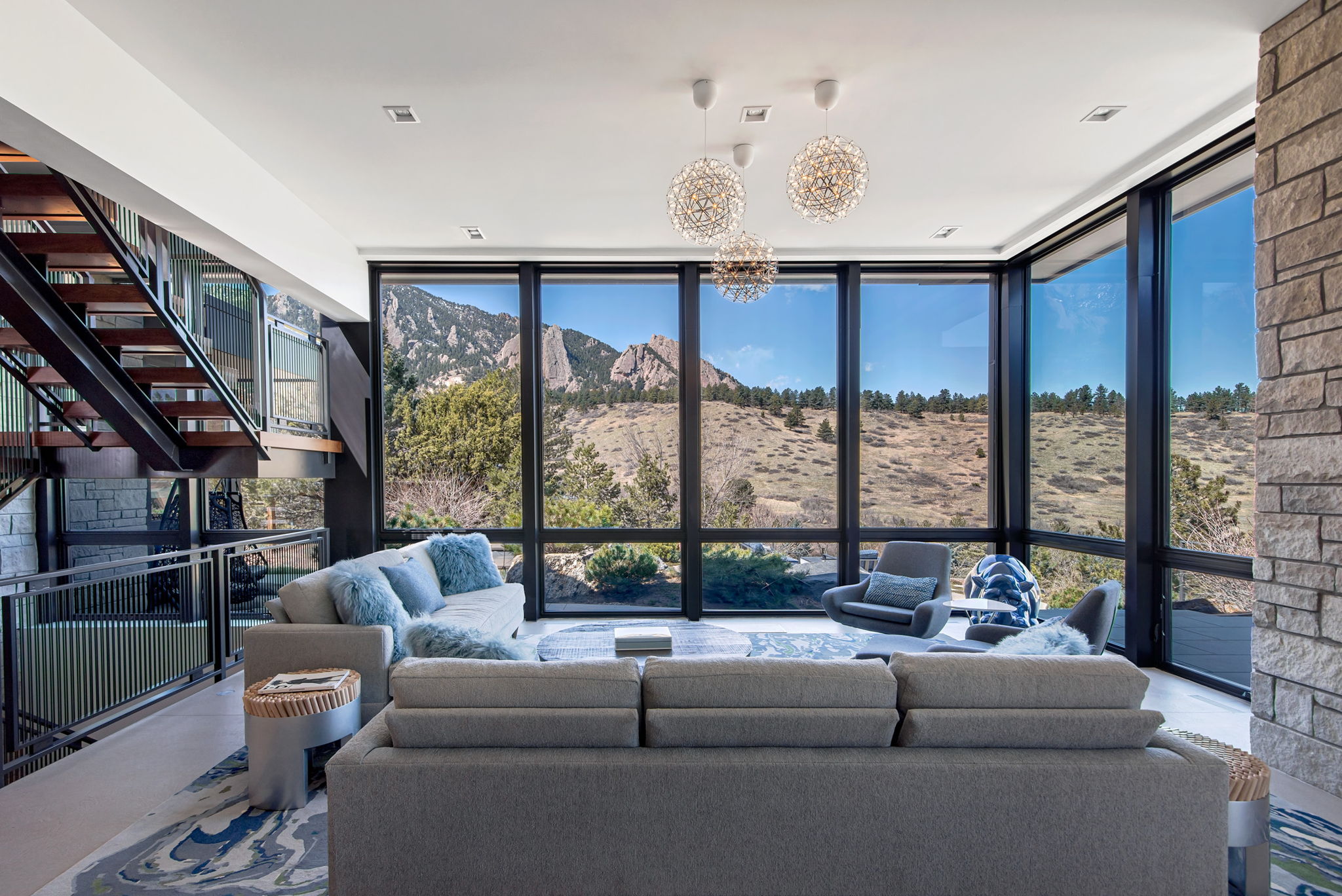 A living room enveloped by nature.