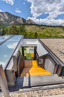 Automated roof top skylight opens to a rooftop deck. Perfect for entertaining.