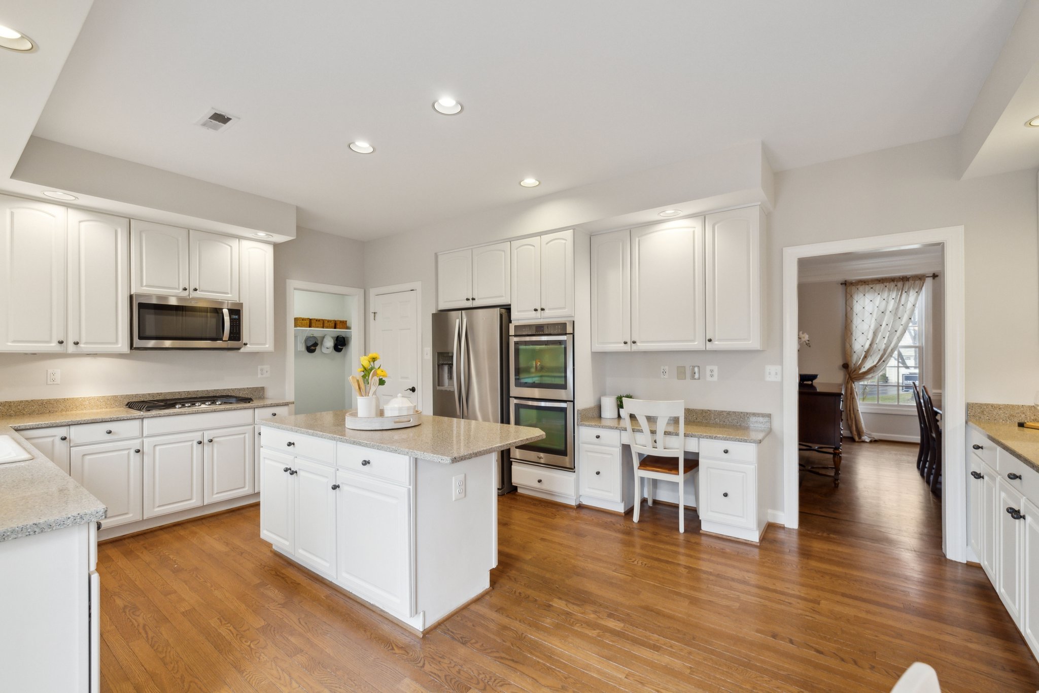 Gourmet Kitchen w/ Stainless Steel Appliances and Center Island