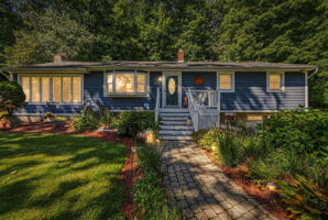Set beneath a beautiful weeping cherry tree on a quiet Vernon cul-de-sac, 18 Fox Hollow Court offers charming curb appeal and easy ranch-style living. Its soft blue exterior and tree-lined backyard create a peaceful, private setting.