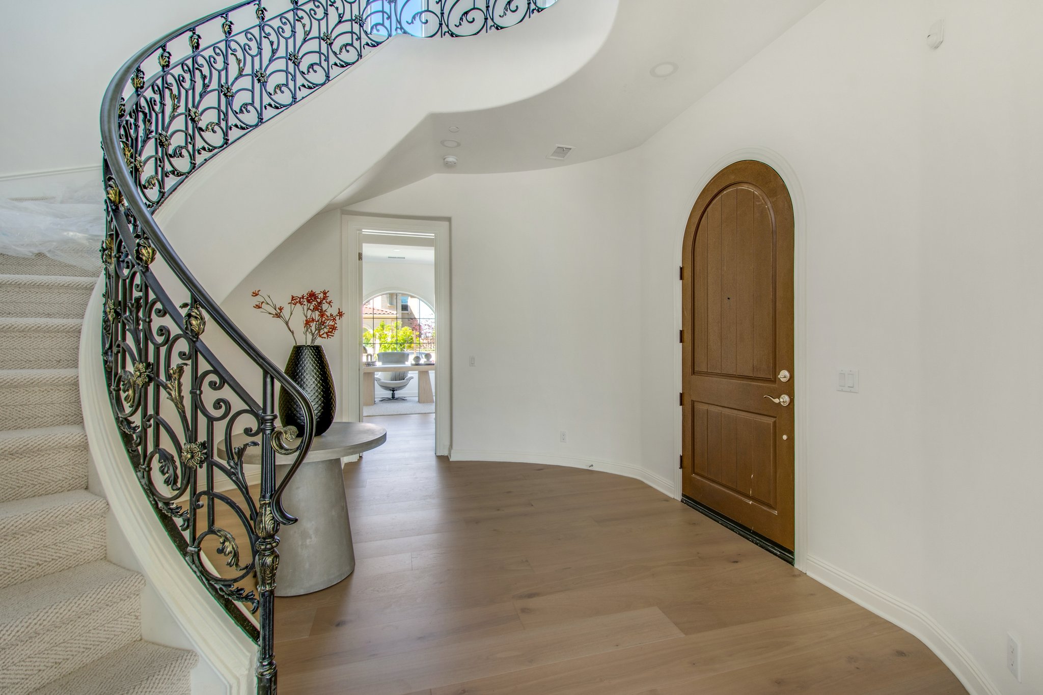 The Grand entry also leads to Suite #5 currently uitilized as a office