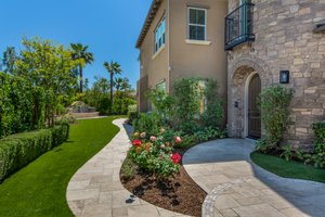The front door with access through the gated front courtyard