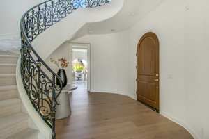 The Grand entry also leads to Suite #5 currently uitilized as a office