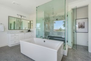 Primary Bathroom features large step-in shower and soaking tub
