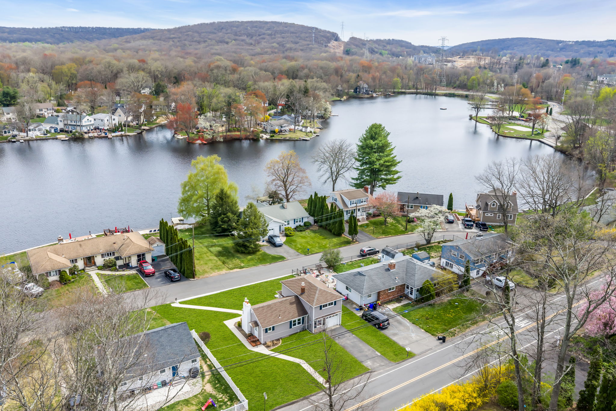 Aerial of house with lakefront lot