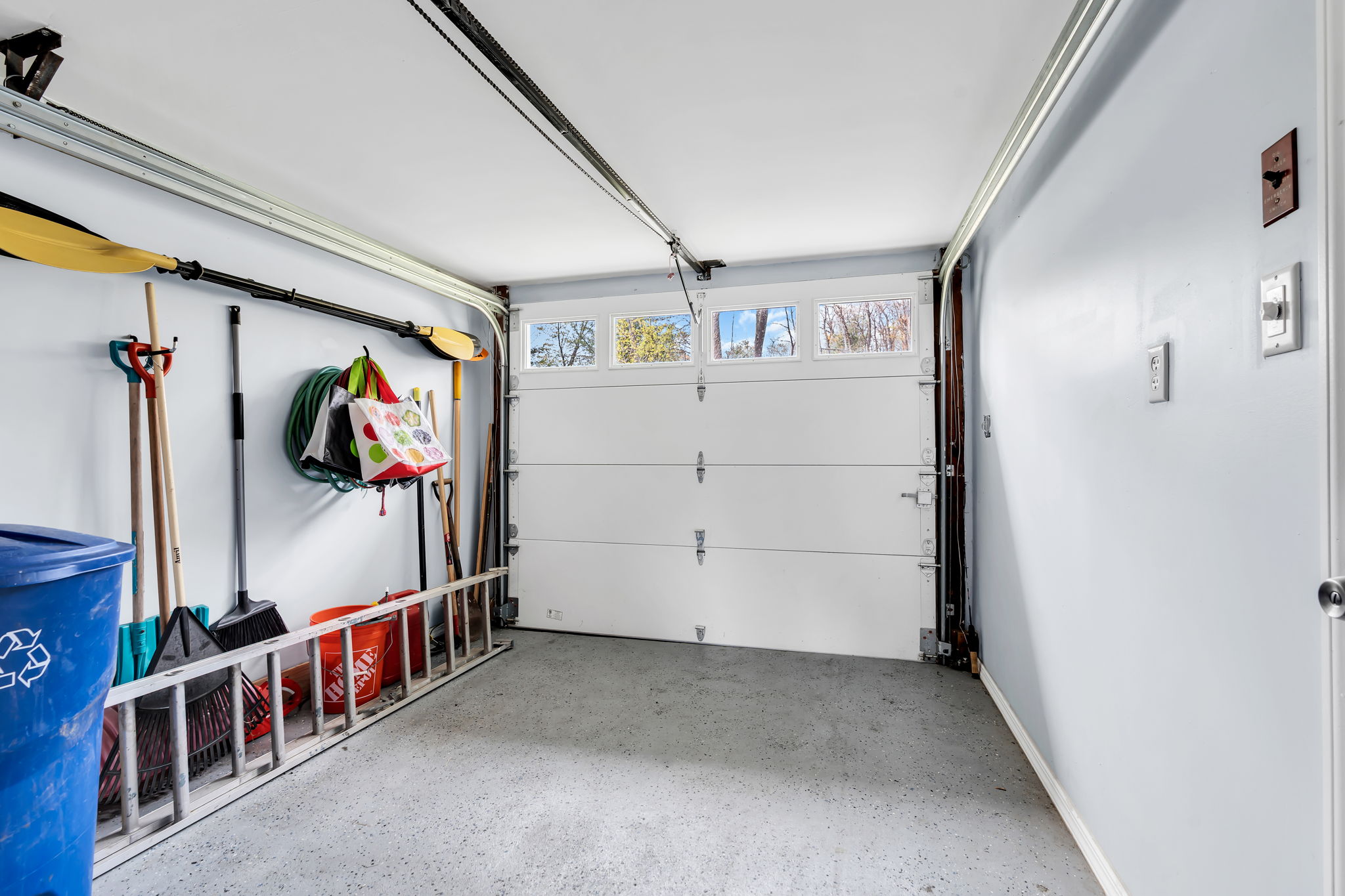 Finished one car garage, new vinyl overhead door with keyless entry