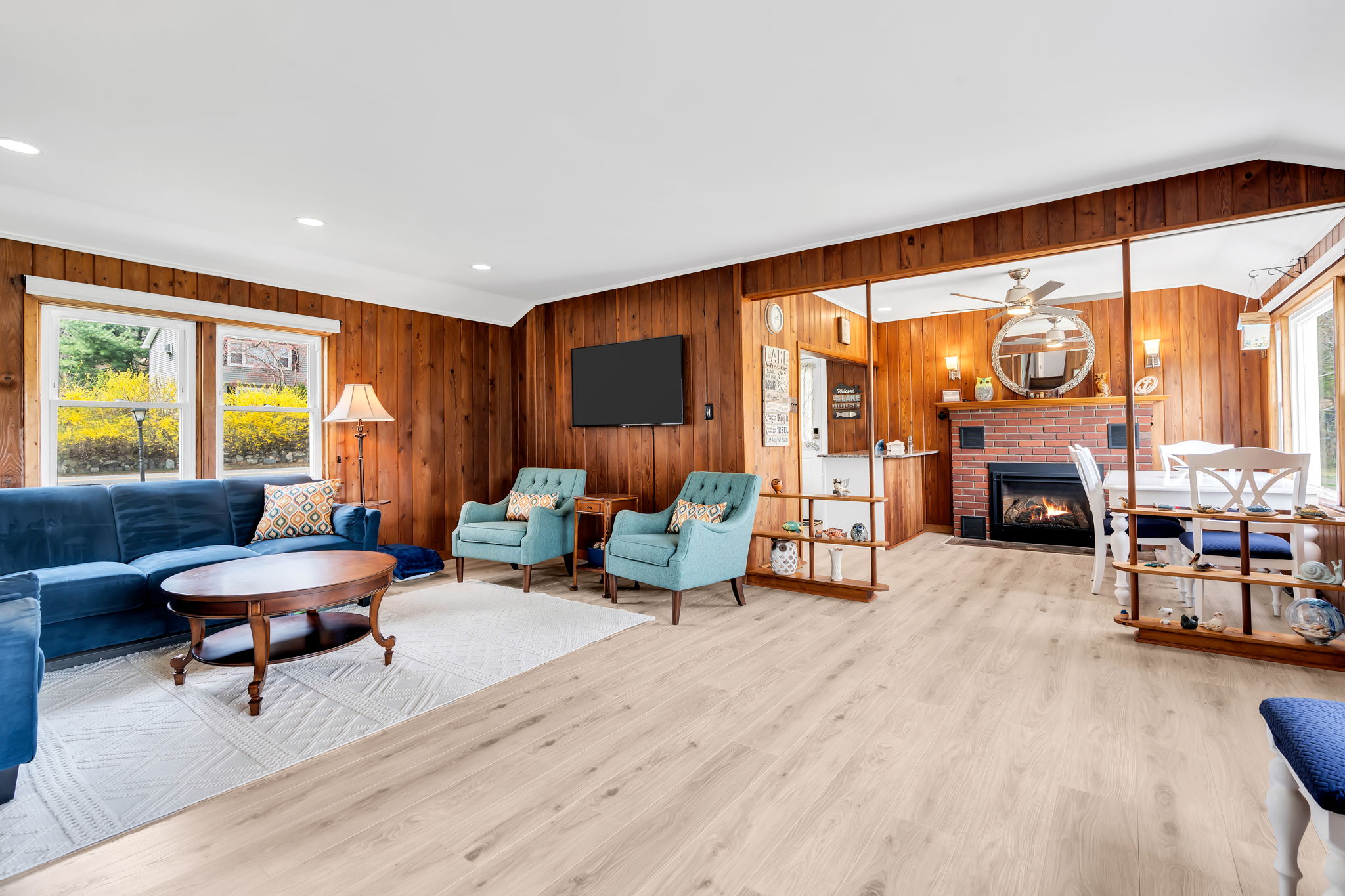 Living rm opens to dining with gas fireplace