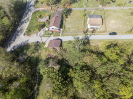 LOT 1 (inside fence) AND 2 - (wooded land only)