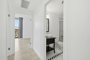 Hallway to Guest Bath and Primary Bedroom