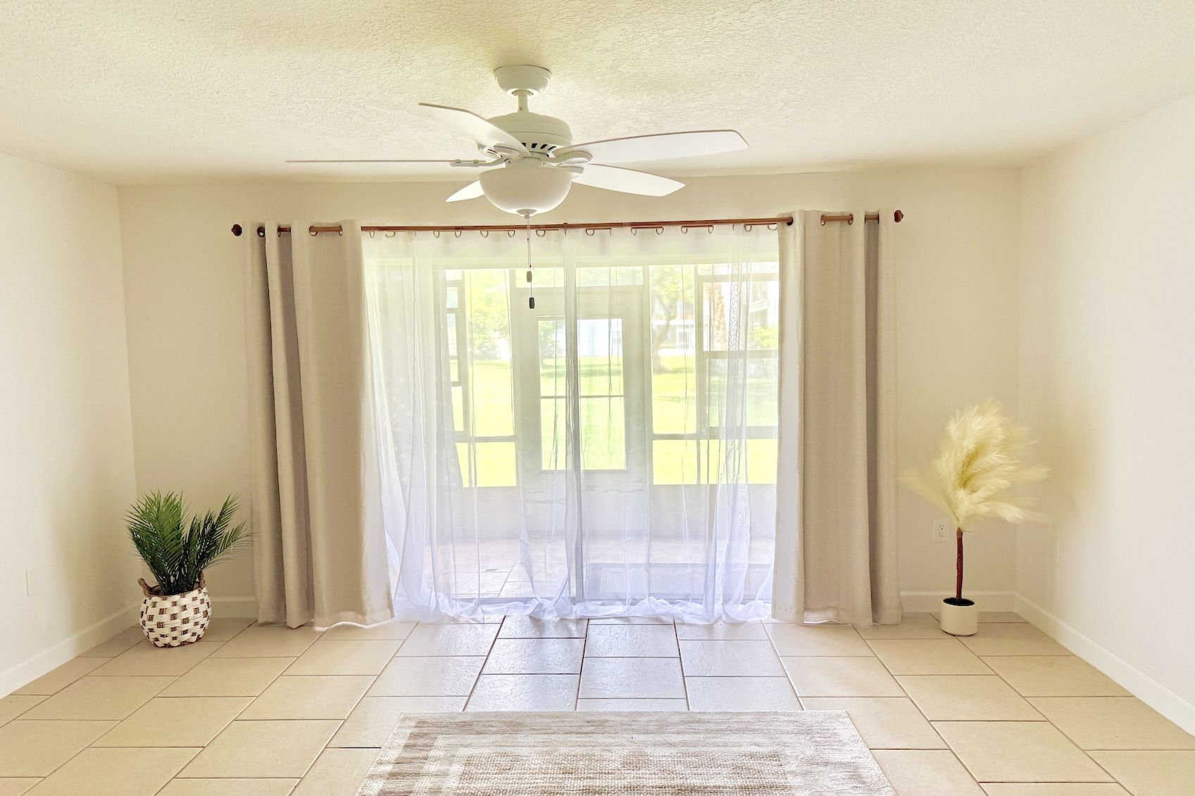 Living Room with View to Patio and Court Yard