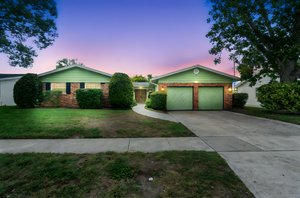 1806 Elsa St Orlando FL 32806 1 day to dusk.jpeg