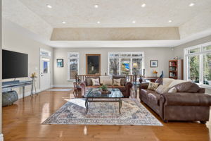 Pot lights, hardwood floors and tray ceilings