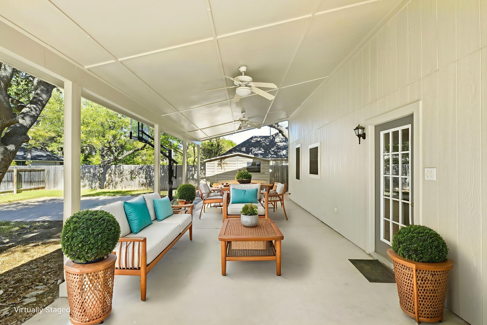 Covered Back Patio virtually staged.jpeg