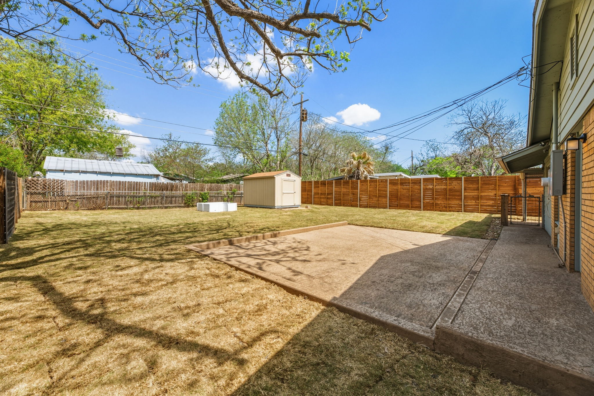 Fenced Backyard with patio and Tuff Shed (8x12)