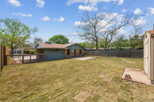 Fenced Backyard, View of Carport