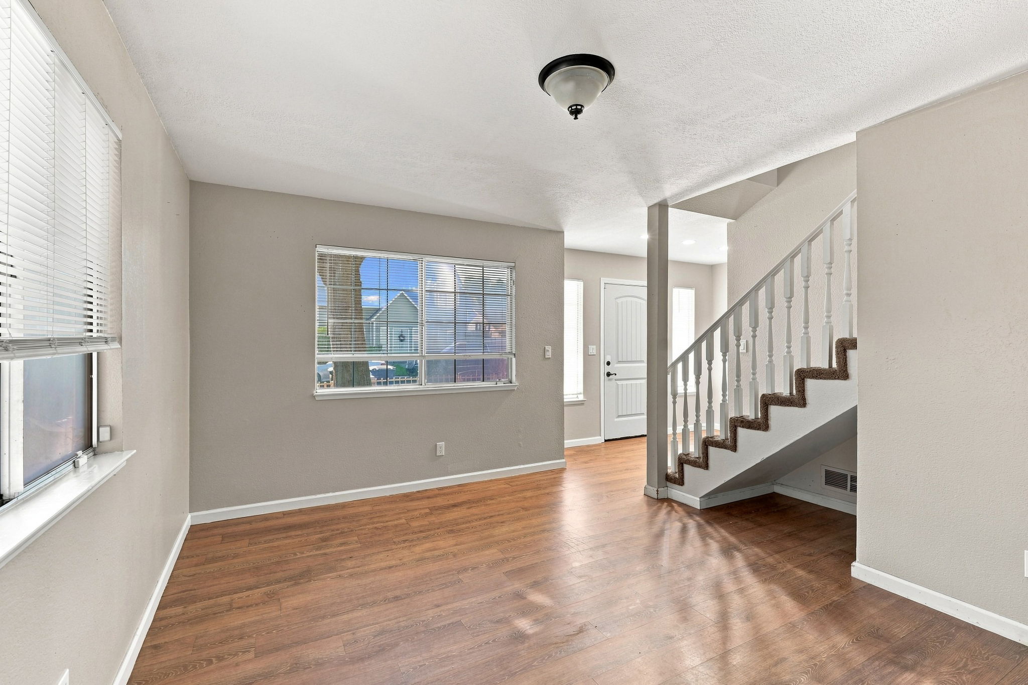 Entry and dining area with staircase