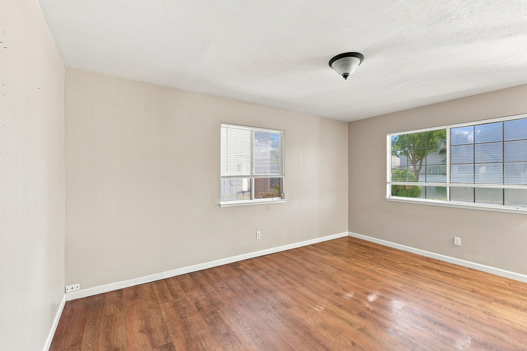 Entry and dining area with multiple windows