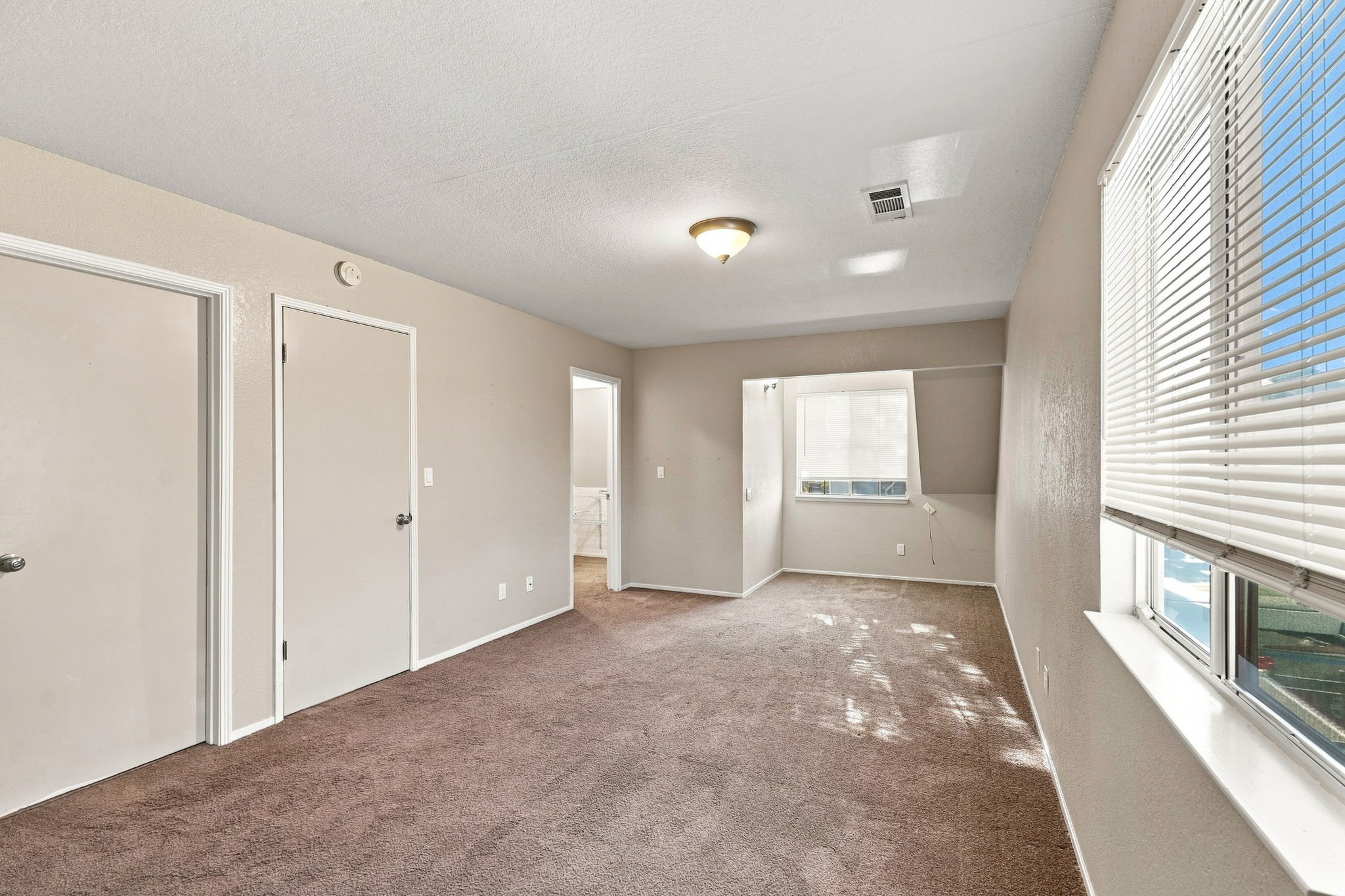 Primary bedroom 2 with organized closet storage
