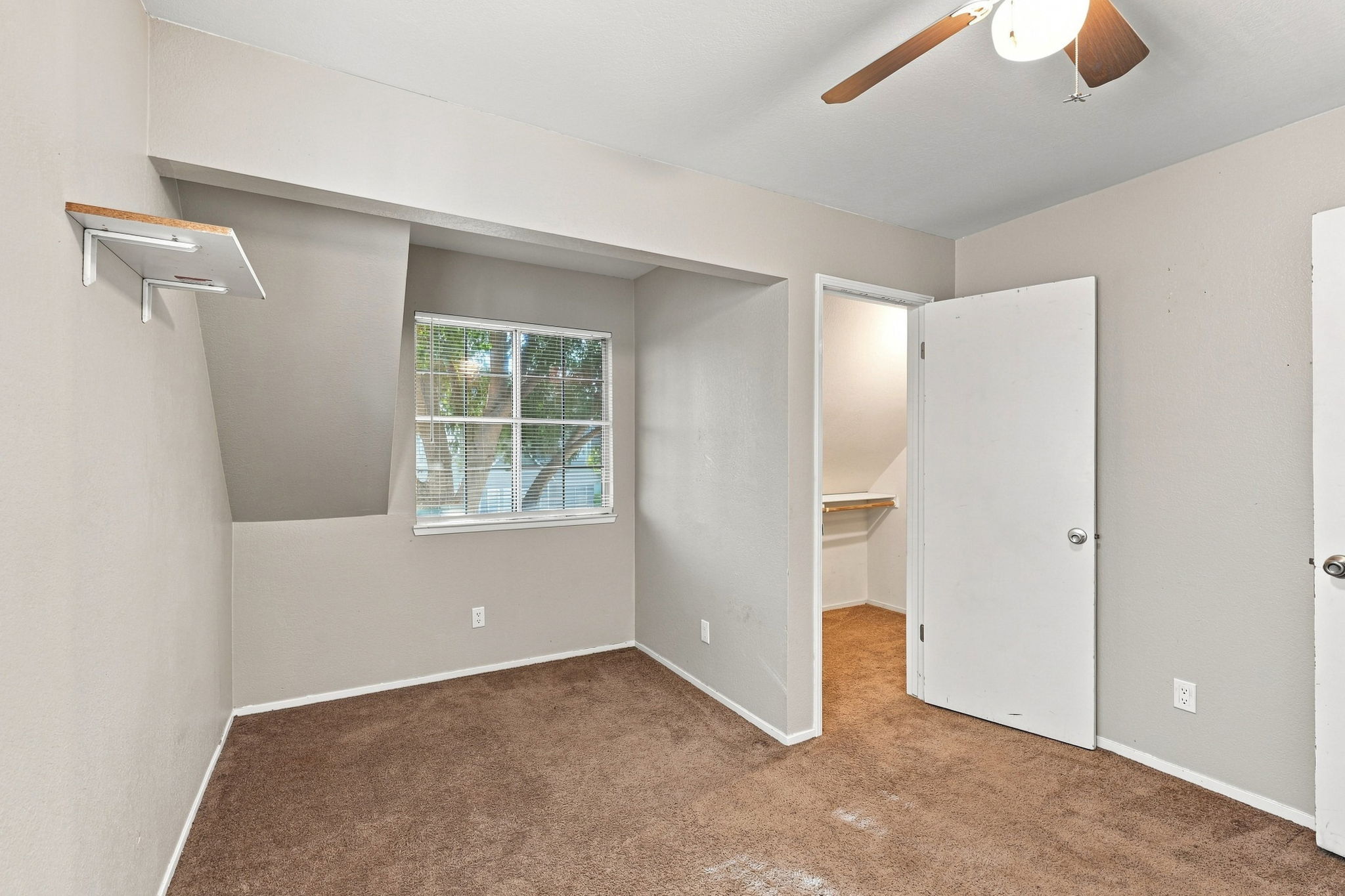 Bedroom 4 with recessed alcove and closet access