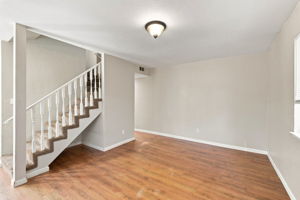 Flexible dining area beside the staircase