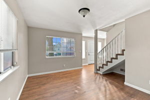 Entry and dining area with staircase