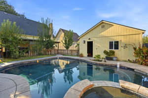Pool and spa with garage backdrop