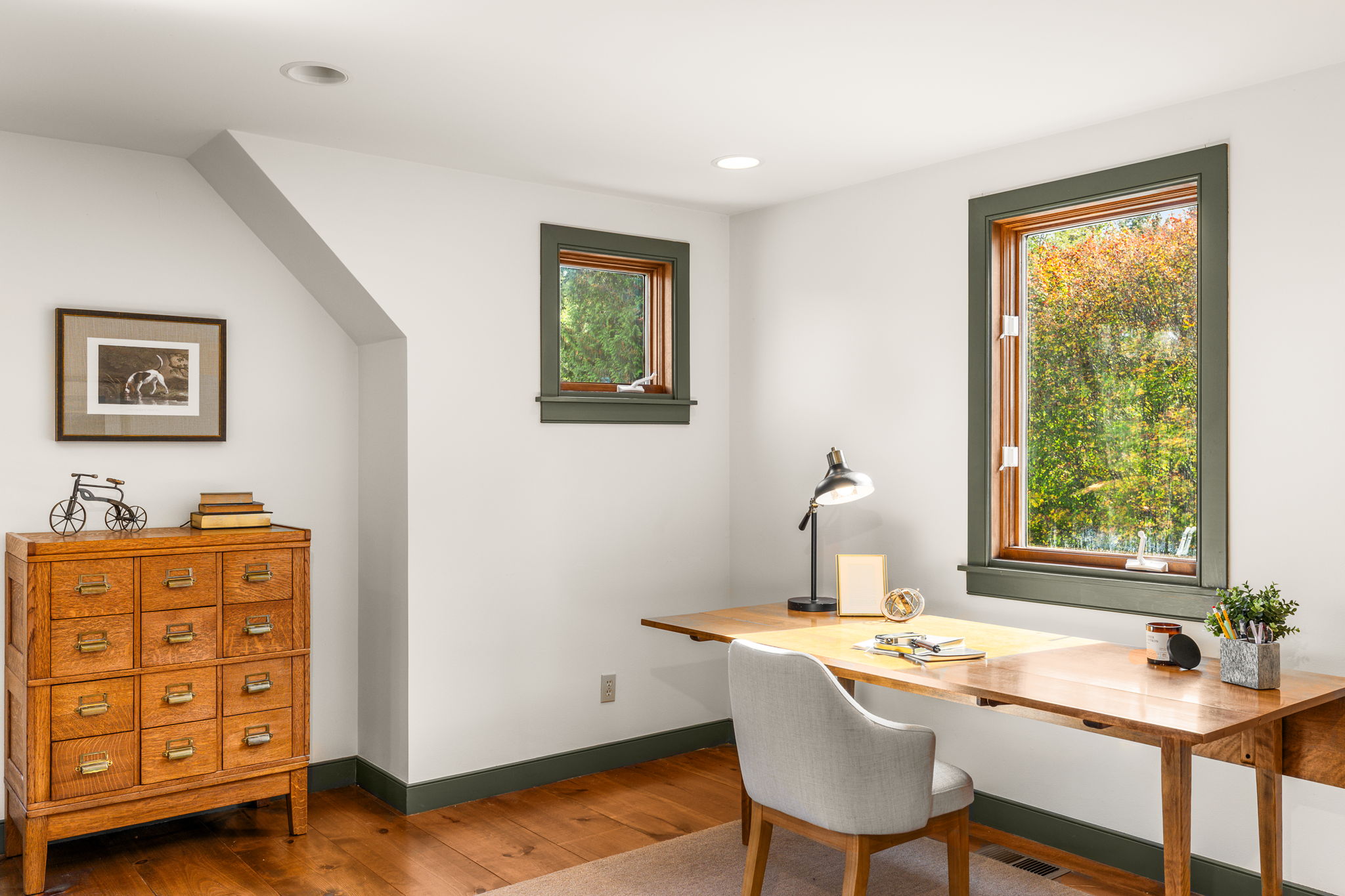 Natural light fills the second bedroom’s adjoining area, creating a pleasant spot for work or hobbies.