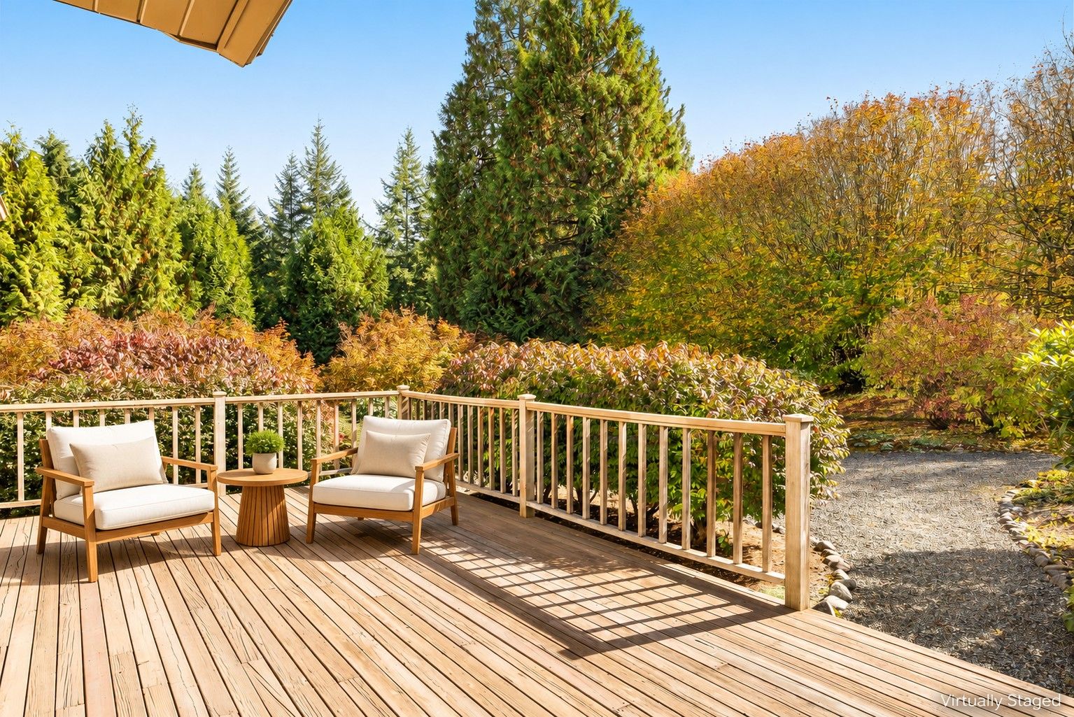 Step onto the spacious deck for outdoor dining and relaxed afternoons surrounded by mature trees and colorful gardens (AI enhanced photo).
