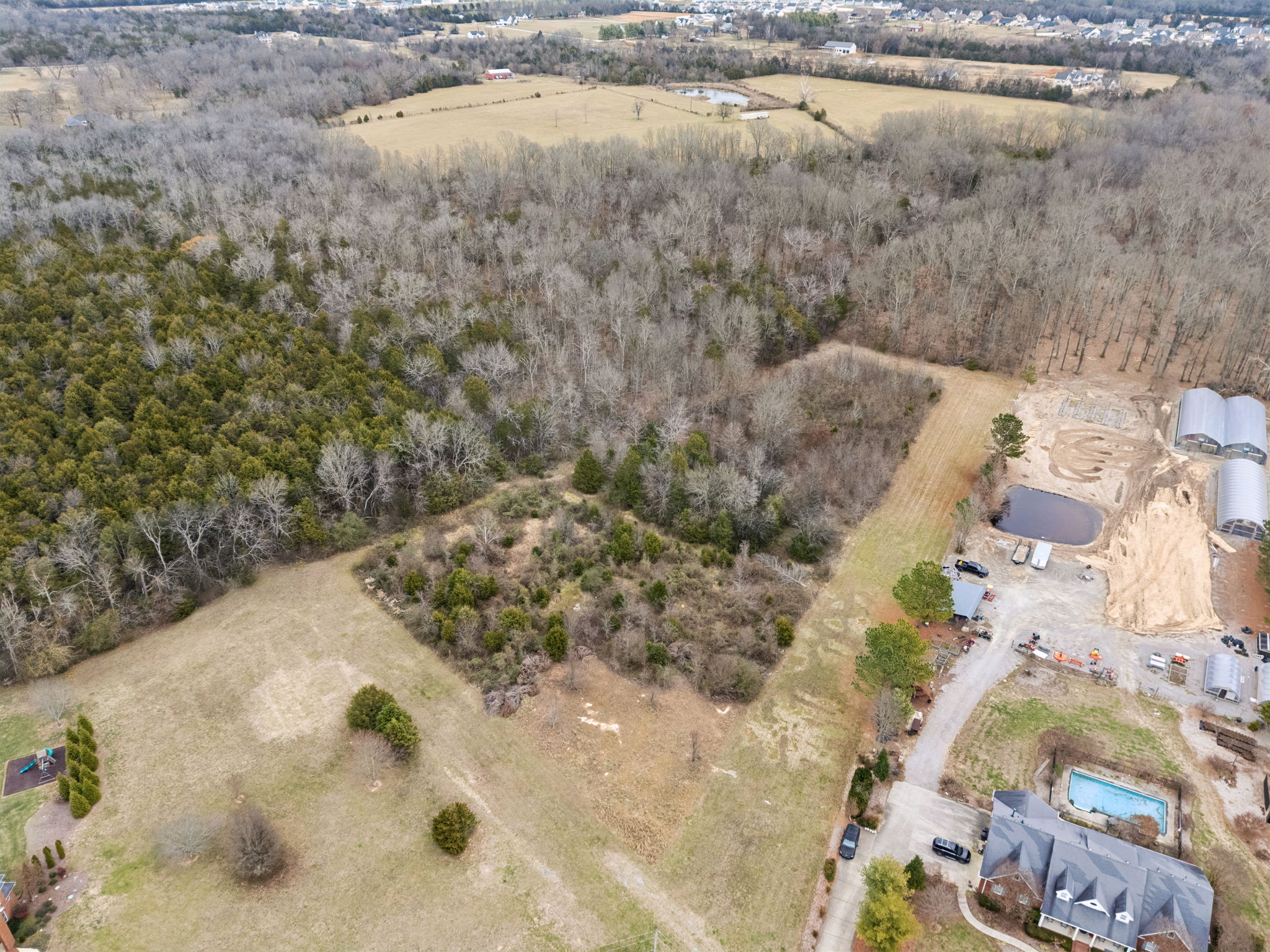 So many possibilities - opportunity to build your dream home on 5.61 acres.  See plat plan on listing for perc locations.