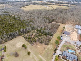 So many possibilities - opportunity to build your dream home on 5.61 acres.  See plat plan on listing for perc locations.