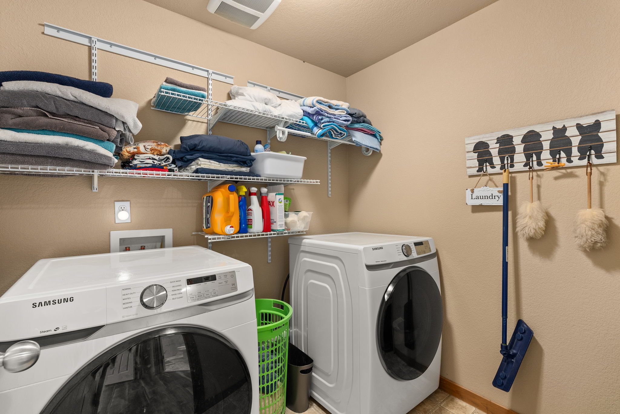 Convenient upstairs laundry with plenty of storage space