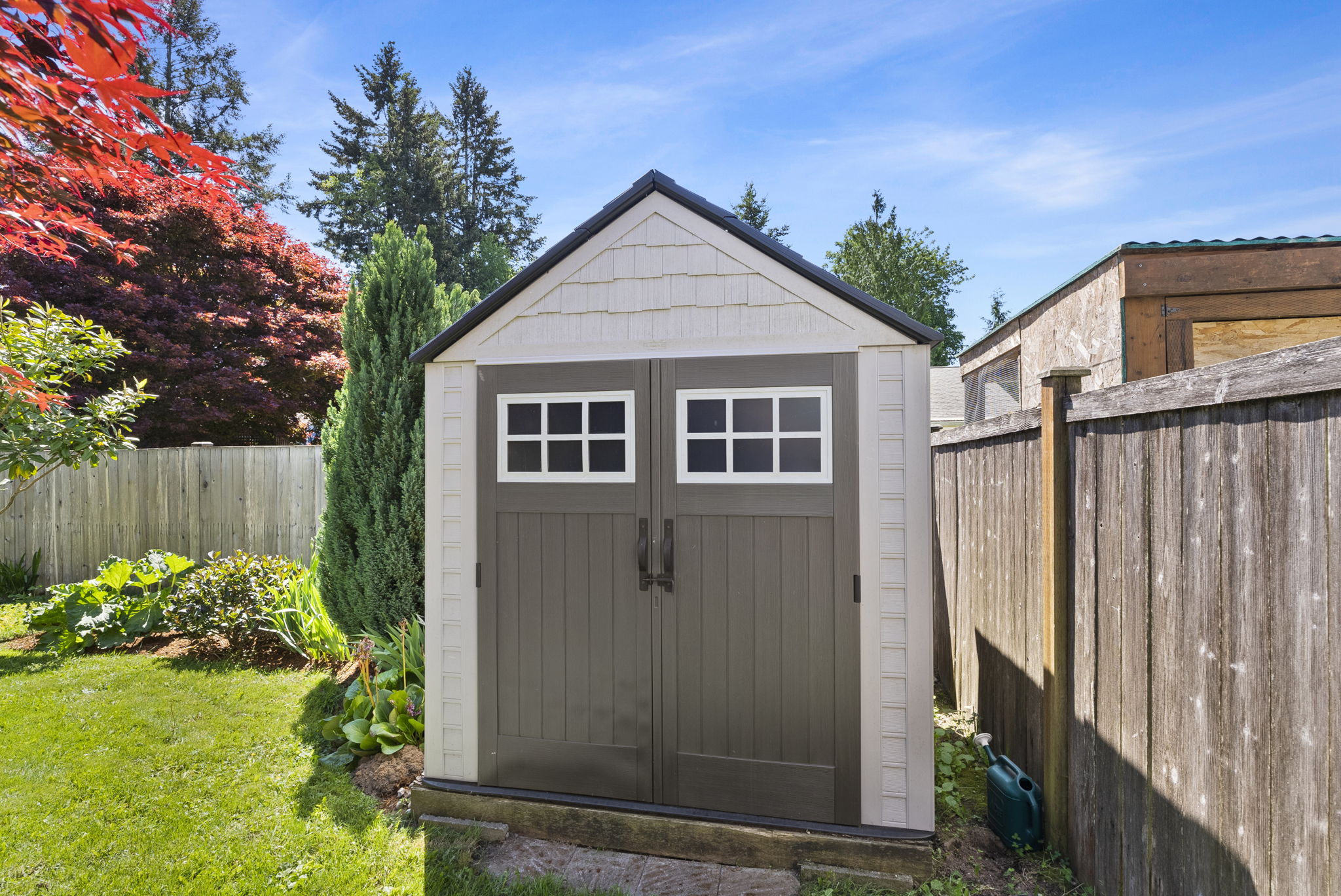 Storage shed included in the backyard for added convenience