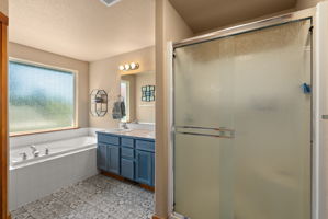 Well-appointed primary ensuite