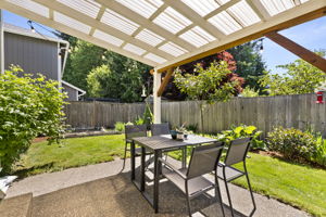 Relax under the covered area with a view of the garden and yard