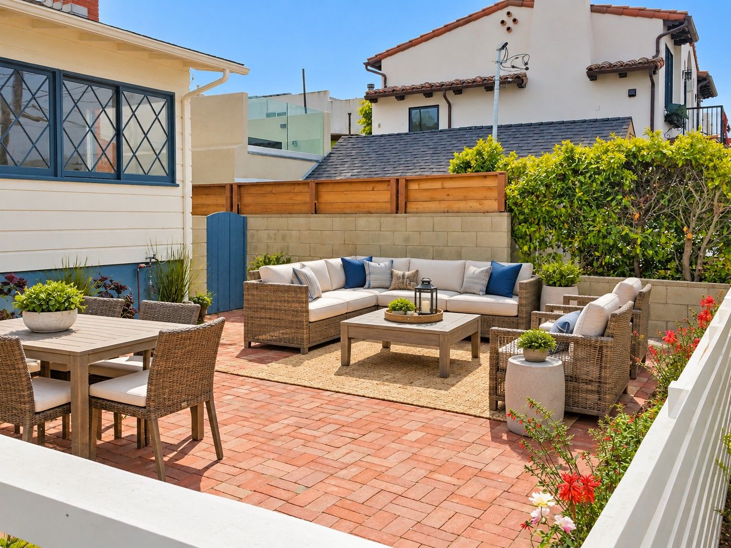 The Large Brick Front Yard is Private with Newer Fencing, a Block Wall and Nice Landscaping. Virtually Staged