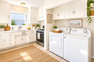 The Kitchen has Ample Storage Cabinets and a Wide Counter Top. The Kitchen could Easily be Remodeled and Reconfigured. Virtually Staged