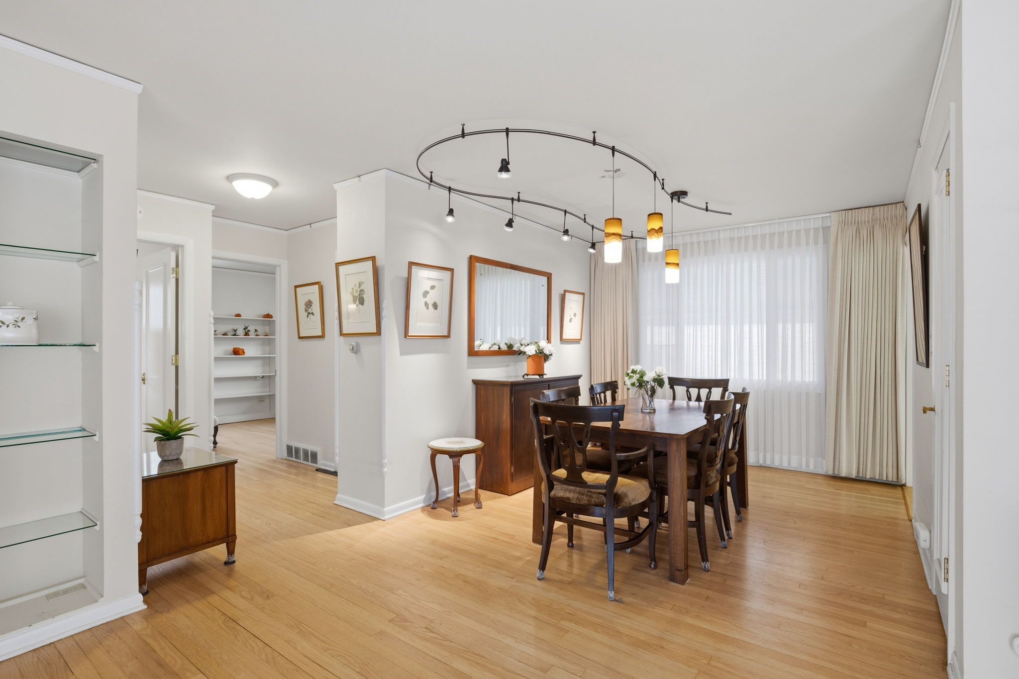 Living room opens to separate dining room with pantry