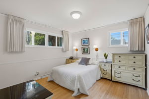 Primary bedroom is sunny and bright