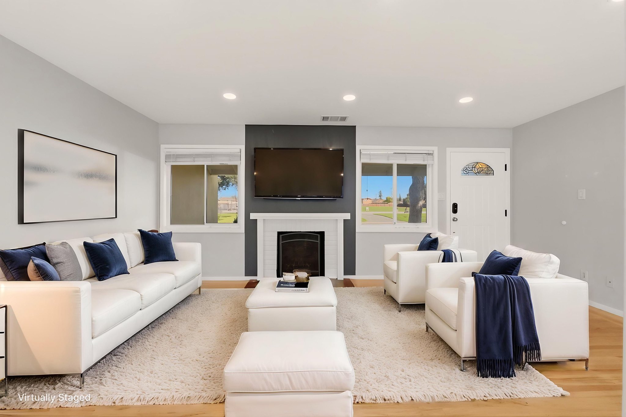 02_Living_Room_Head_On virtually staged.jpeg